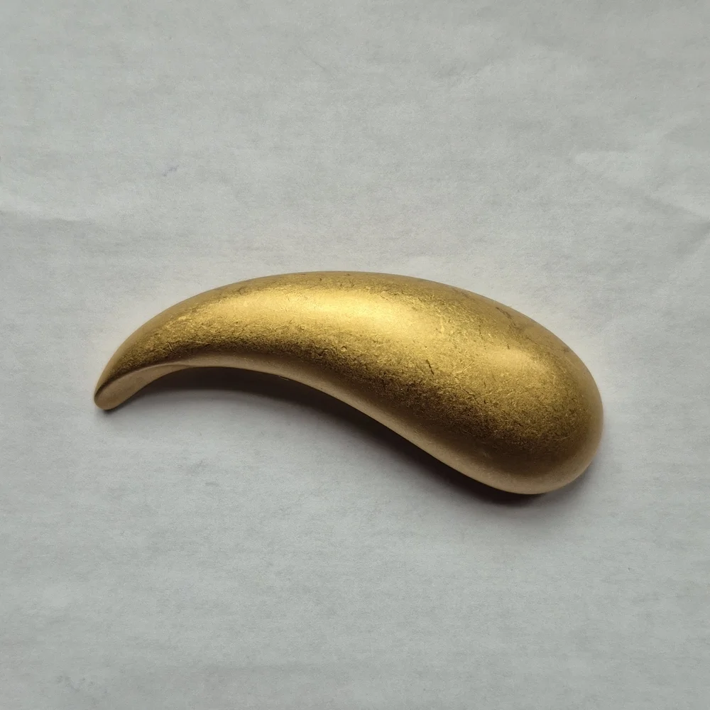 Vintage signed Trifari gold tone swoosh bar Brooch
